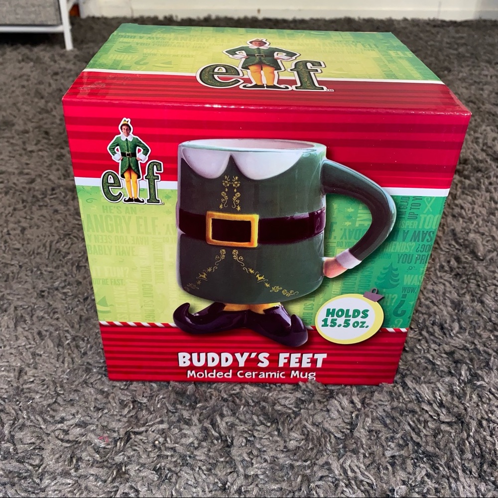 Elf themed coffee mug. Unopened
